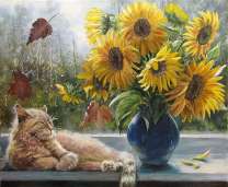 Подсолнухи в синей вазе возле кота